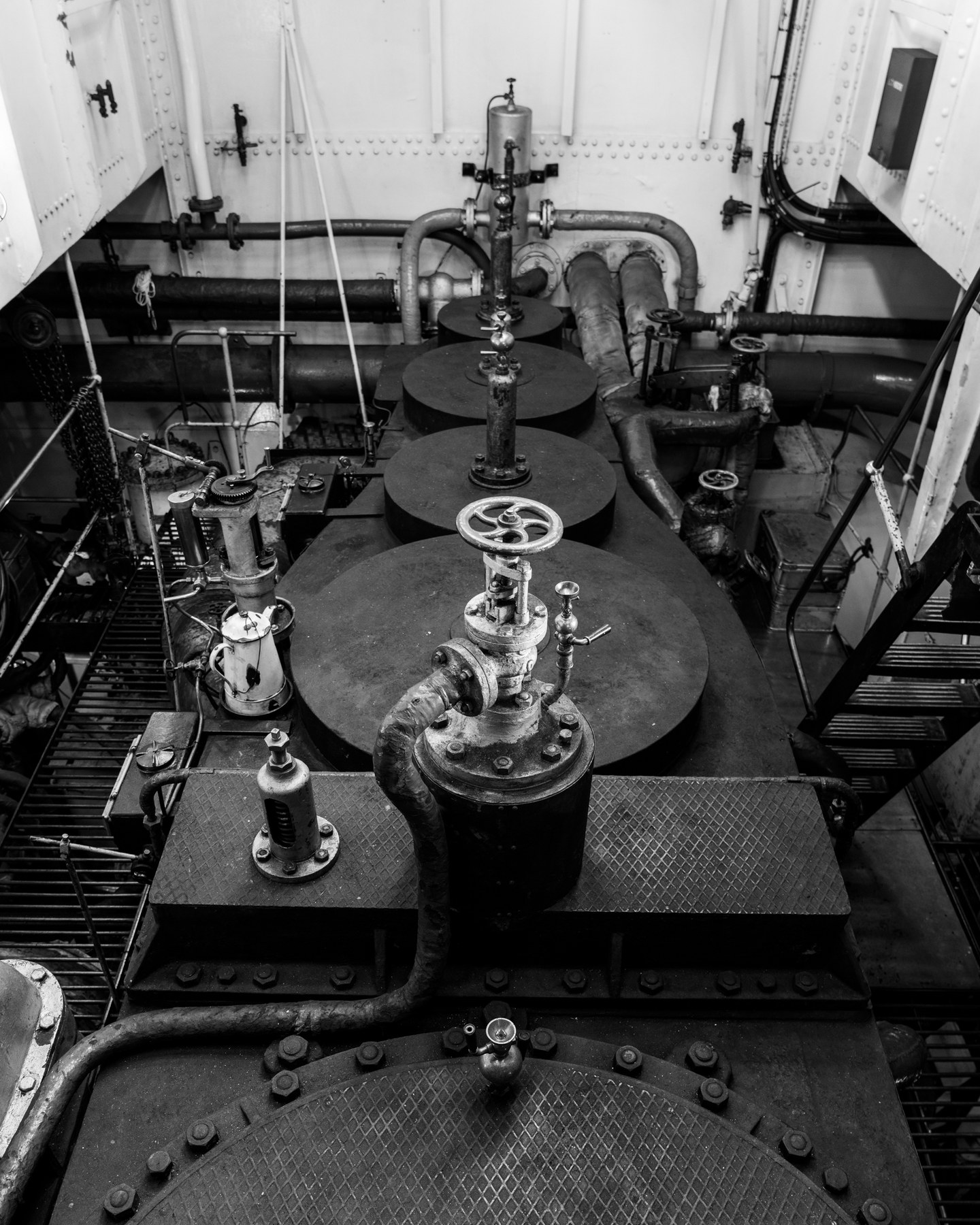 SS Stettin engine room, Plate 2: Cylinder Heads — photograph by Don Gillikin