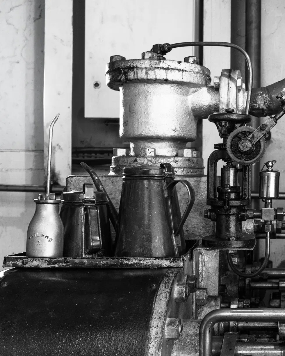SS Stettin engine room, Plate 5: Oil Cans — photograph by Don Gillikin